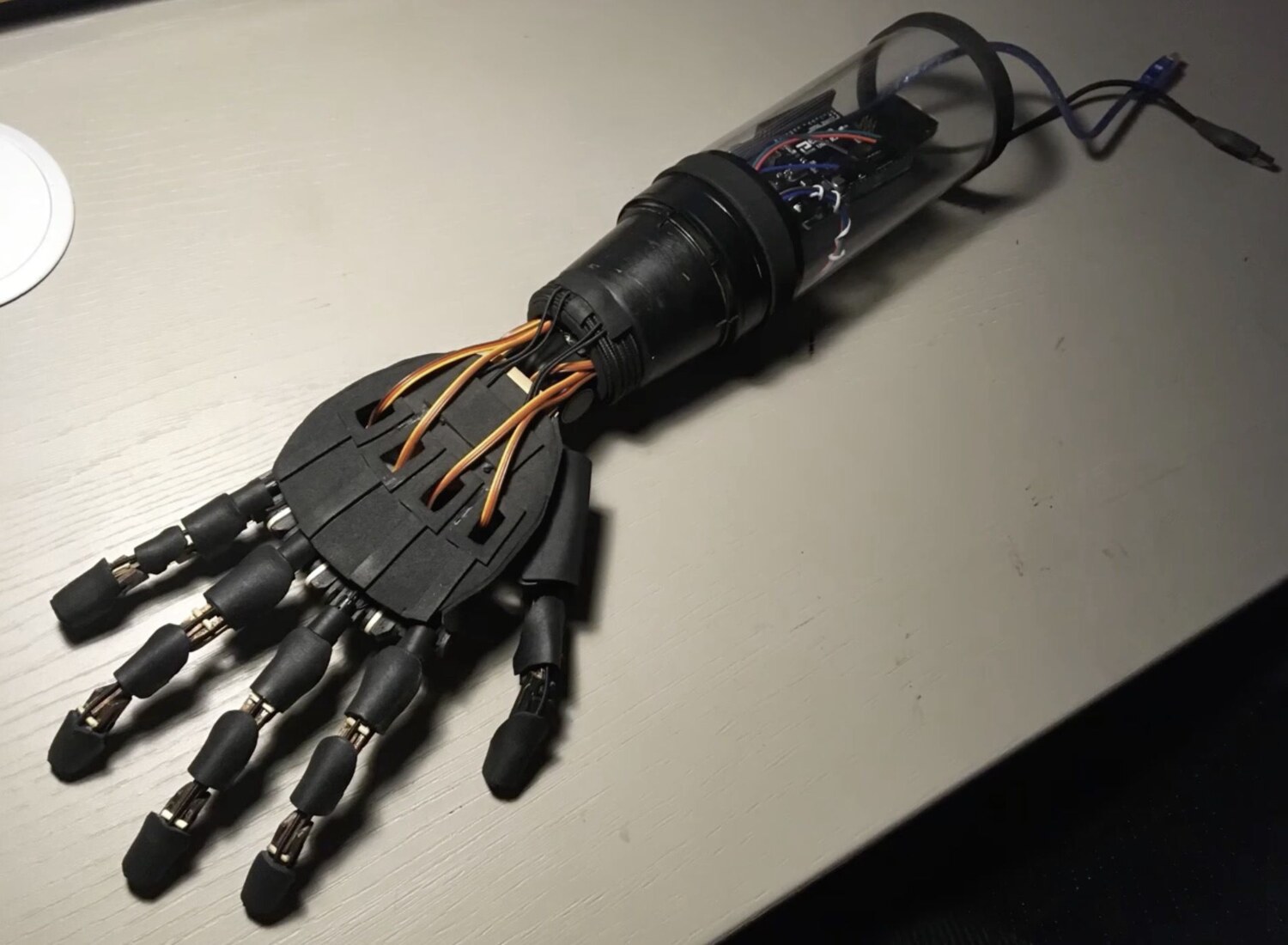 Tendon-driven bionic arm reference build